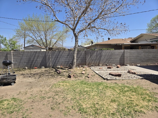 908 W Chavez Ave, Belen, NM 87002 - view of yard with fence private yard
