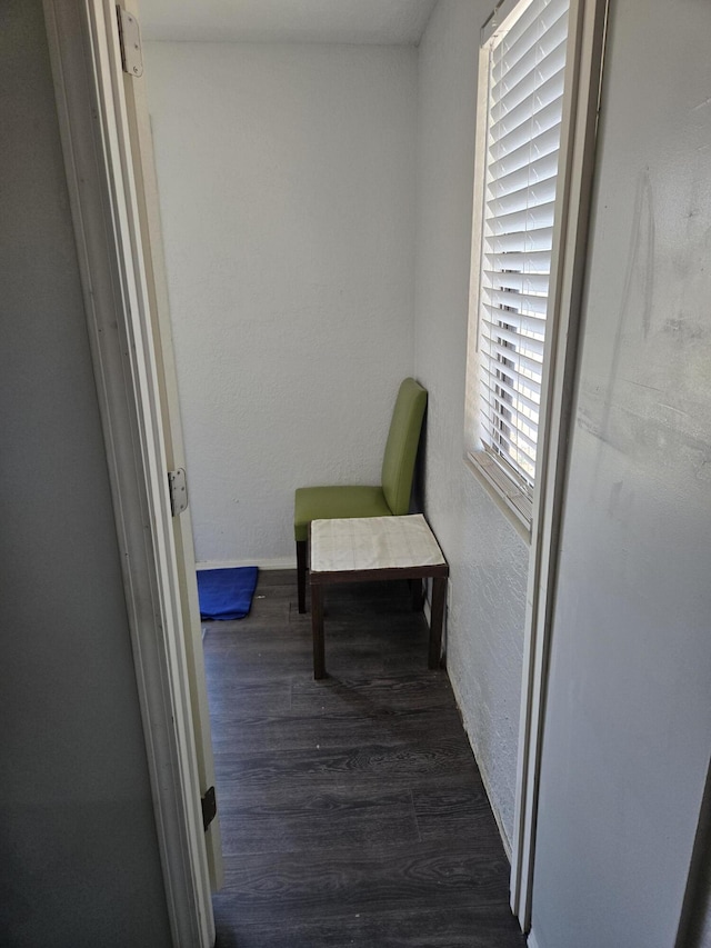 908 W Chavez Ave, Belen, NM 87002 - interior space with baseboards, a textured wall, and wood finished floors