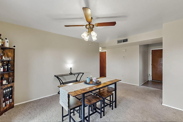 1513 Muriel St NE, Albuquerque, NM 87112 - dining area with carpet flooring and a ceiling fan