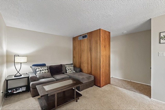 1513 Muriel St NE, Albuquerque, NM 87112 - living room featuring carpet flooring and a textured ceiling