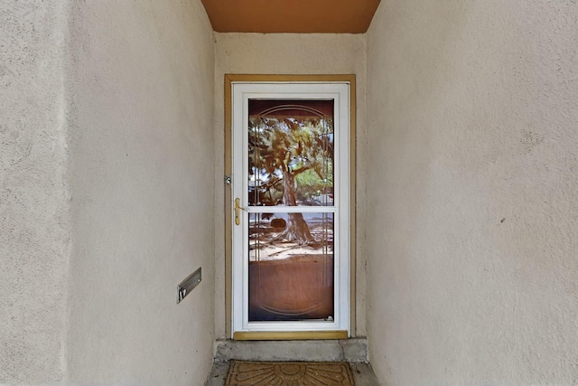 1513 Muriel St NE, Albuquerque, NM 87112 - doorway to property with stucco siding