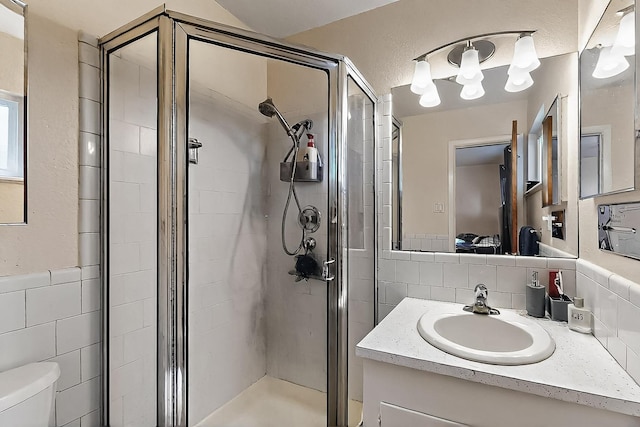 1513 Muriel St NE, Albuquerque, NM 87112 - full bath featuring tile walls, a shower stall, and vanity