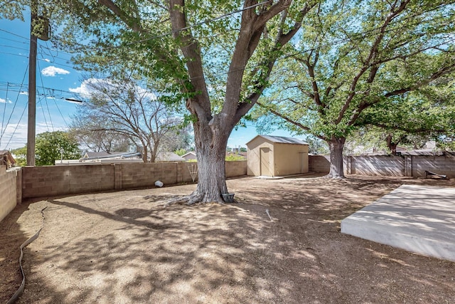 1513 Muriel St NE, Albuquerque, NM 87112 - fenced backyard with a storage shed
