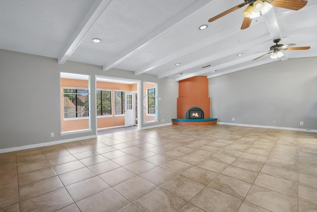 7225 Ticonderoga Rd NE, Albuquerque, NM 87109 - unfurnished living room with baseboards, light tile patterned floors, and a large fireplace