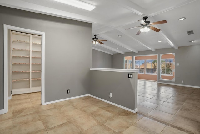 7225 Ticonderoga Rd NE, Albuquerque, NM 87109 - unfurnished room with baseboards, a ceiling fan, light tile patterned floors, and beam ceiling