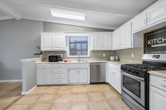 7225 Ticonderoga Rd NE, Albuquerque, NM 87109 - kitchen featuring baseboards, vaulted ceiling with beams, white cabinets, a sink, and stainless steel appliances