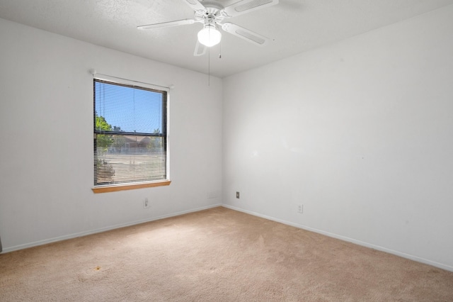 7225 Ticonderoga Rd NE, Albuquerque, NM 87109 - unfurnished room with baseboards, ceiling fan, and light colored carpet