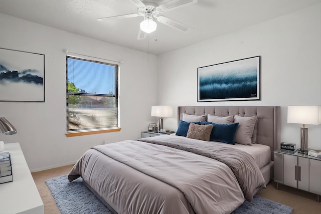 7225 Ticonderoga Rd NE, Albuquerque, NM 87109 - bedroom with baseboards, a ceiling fan, and light carpet