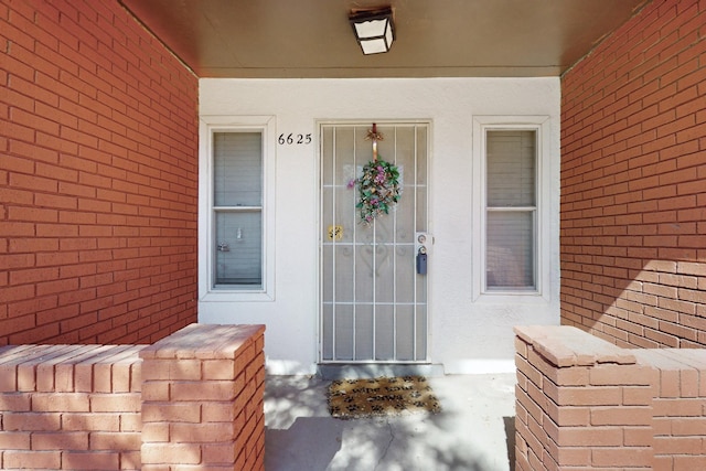 6625 Barnhart St NE, Albuquerque, NM 87109 - entrance to property with covered porch and stucco siding