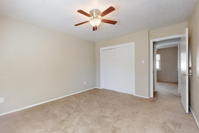 6625 Barnhart St NE, Albuquerque, NM 87109 - unfurnished bedroom featuring a closet, a ceiling fan, carpet, and baseboards