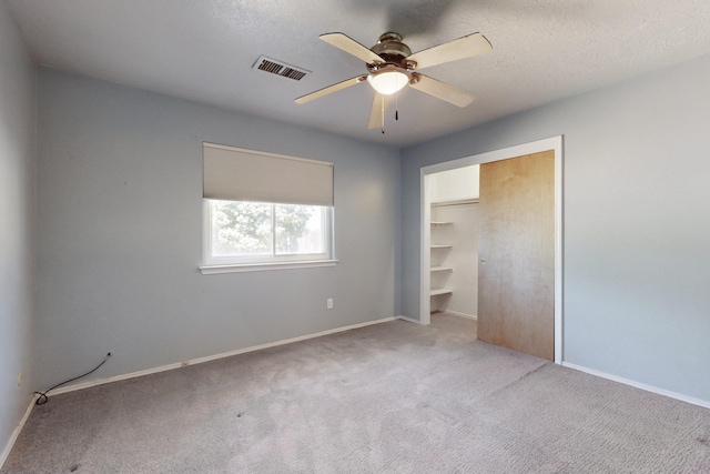 6625 Barnhart St NE, Albuquerque, NM 87109 - unfurnished bedroom featuring carpet floors, baseboards, a ceiling fan, and visible vents