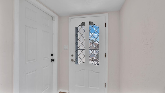 11119 Sidney Ave NE, Albuquerque, NM 87111 - doorway featuring baseboards