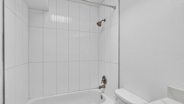 11119 Sidney Ave NE, Albuquerque, NM 87111 - bathroom featuring toilet and shower / bathing tub combination