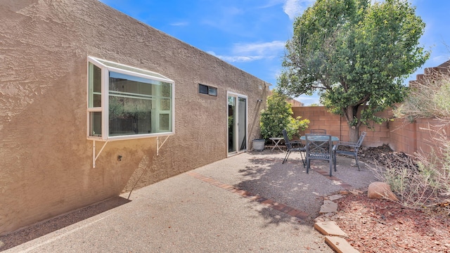 11119 Sidney Ave NE, Albuquerque, NM 87111 - view of patio / terrace featuring fence and outdoor dining area