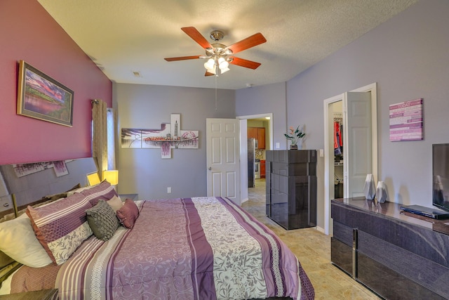 5679 Cold Creek Ave NW, Albuquerque, NM 87114 - bedroom featuring stainless steel fridge, ceiling fan, and visible vents