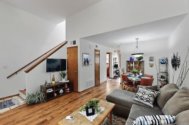 living area with visible vents and light wood-type flooring