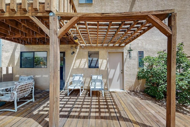 wooden terrace with a pergola