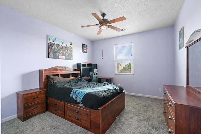 bedroom featuring a textured ceiling, baseboards, light colored carpet, and visible vents