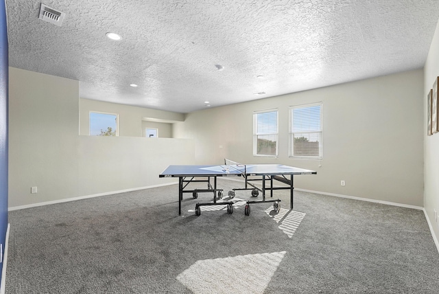 playroom with carpet floors, a textured ceiling, recessed lighting, baseboards, and visible vents