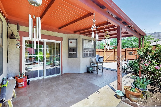 view of patio with fence