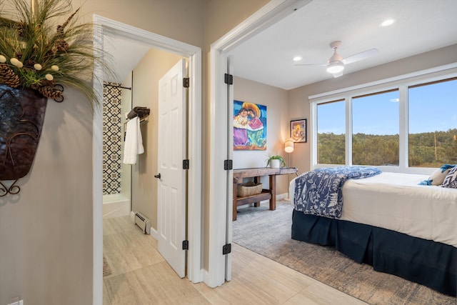 bedroom with recessed lighting, baseboards, a baseboard heating unit, and a ceiling fan
