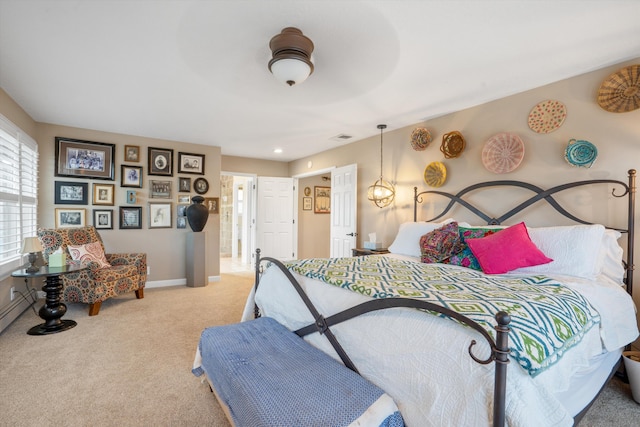 bedroom with baseboards, visible vents, and light colored carpet