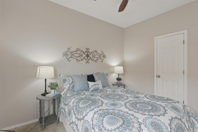 bedroom with baseboards, ceiling fan, and carpet floors