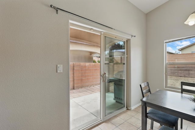 entryway featuring light tile patterned floors
