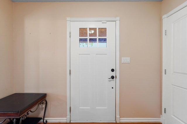 19 Sage Ct, Edgewood, NM 87015 - doorway to outside featuring baseboards