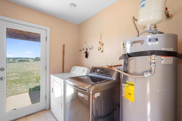 19 Sage Ct, Edgewood, NM 87015 - laundry area featuring water heater, separate washer and dryer, and light tile patterned floors