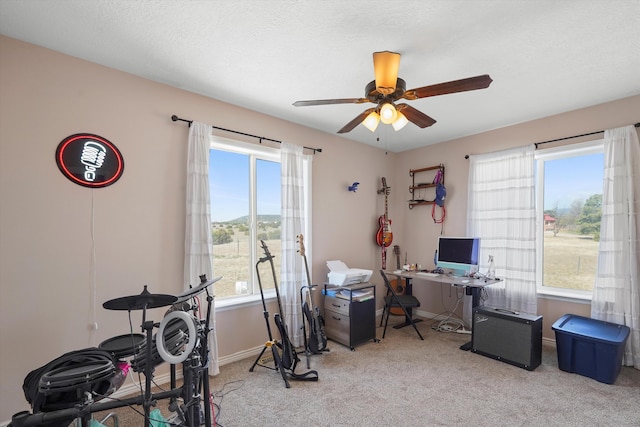 19 Sage Ct, Edgewood, NM 87015 - home office featuring light colored carpet, ceiling fan, and baseboards