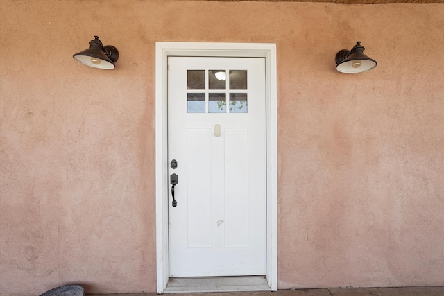 19 Sage Ct, Edgewood, NM 87015 - property entrance with stucco siding