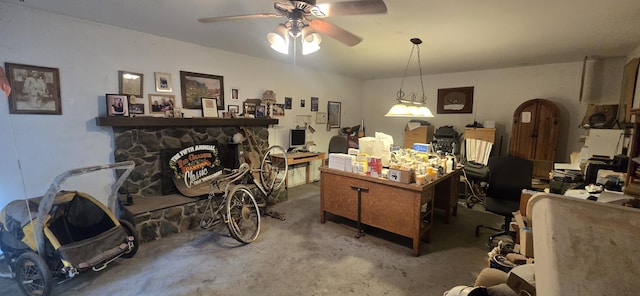 home office featuring ceiling fan and concrete flooring