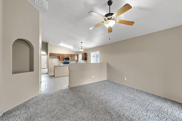 7229 Skagway Dr NE, Rio Rancho, NM 87144 - unfurnished living room with light carpet, a textured ceiling, ceiling fan, lofted ceiling, and baseboards