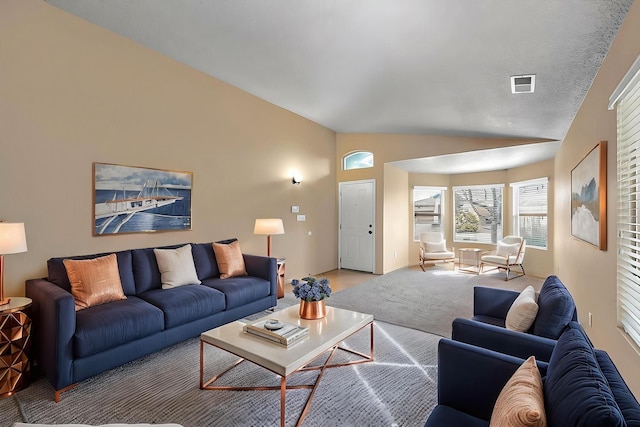 7229 Skagway Dr NE, Rio Rancho, NM 87144 - living room with lofted ceiling and light colored carpet