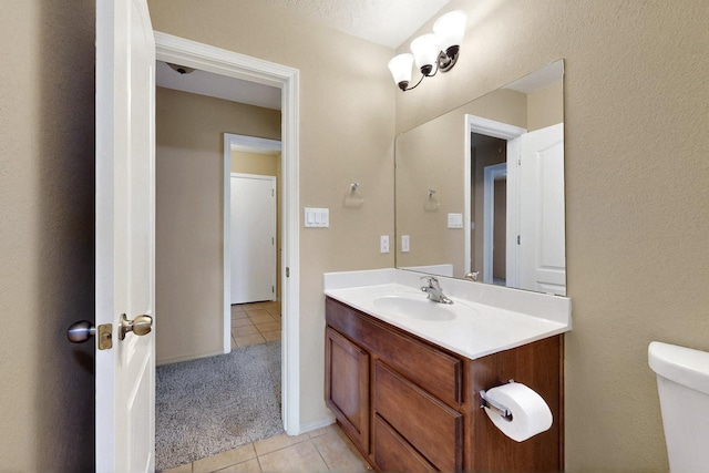 7229 Skagway Dr NE, Rio Rancho, NM 87144 - bathroom featuring tile patterned flooring, vanity, and toilet