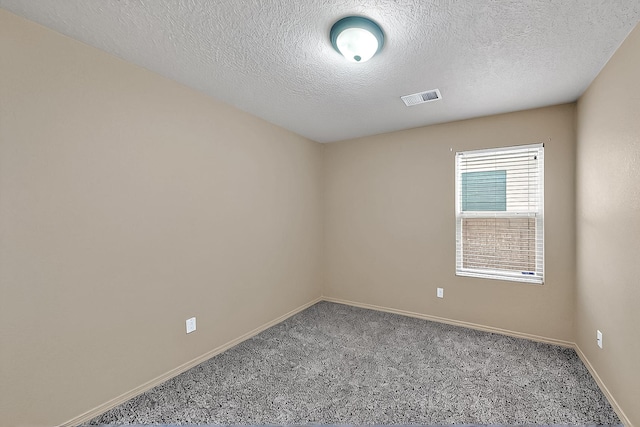 7229 Skagway Dr NE, Rio Rancho, NM 87144 - empty room with carpet flooring, baseboards, and a textured ceiling