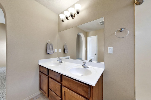 7229 Skagway Dr NE, Rio Rancho, NM 87144 - bathroom with double vanity and tile patterned flooring
