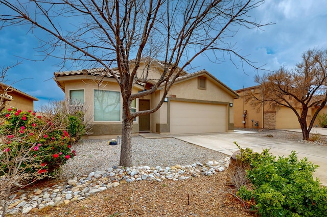7229 Skagway Dr NE, Rio Rancho, NM 87144 - view of front of house with stucco siding, a garage, driveway, and a tile roof