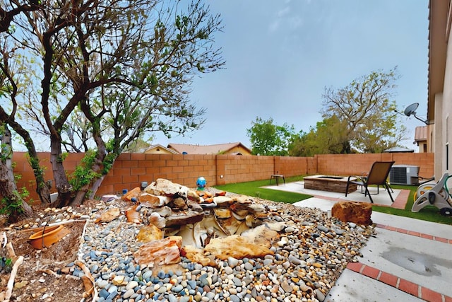 7229 Skagway Dr NE, Rio Rancho, NM 87144 - fenced backyard with a fire pit, a patio, and central air condition unit