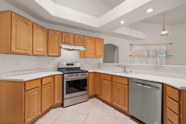 2105 Gila River Rd NE, Rio Rancho, NM 87144 - kitchen with stainless steel appliances, a sink, under cabinet range hood, recessed lighting, and light tile patterned floors