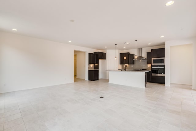 6791 Sydney Dr NE, Rio Rancho, NM 87144 - unfurnished living room featuring a sink and recessed lighting