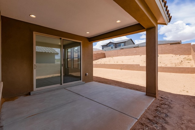 6791 Sydney Dr NE, Rio Rancho, NM 87144 - view of patio with a fenced backyard