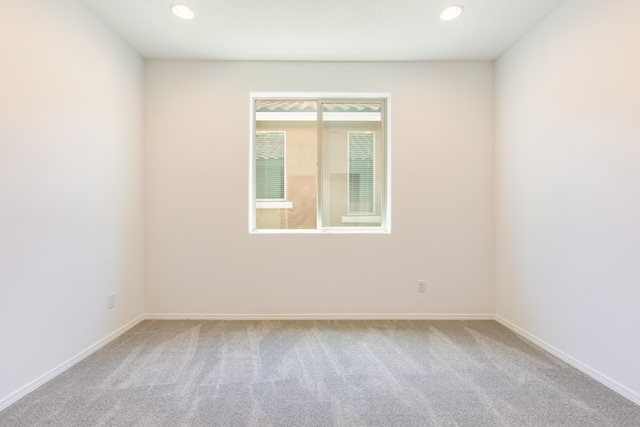 6791 Sydney Dr NE, Rio Rancho, NM 87144 - carpeted spare room featuring baseboards and recessed lighting