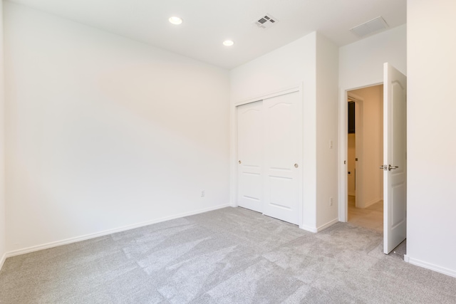 6791 Sydney Dr NE, Rio Rancho, NM 87144 - unfurnished bedroom featuring carpet floors, recessed lighting, a closet, and baseboards