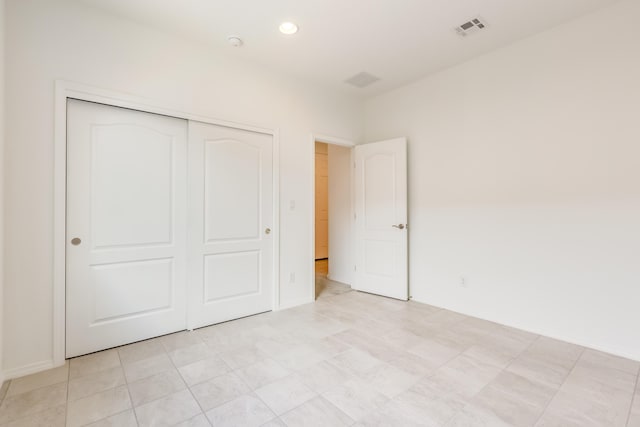 6791 Sydney Dr NE, Rio Rancho, NM 87144 - unfurnished bedroom with a closet, recessed lighting, and baseboards