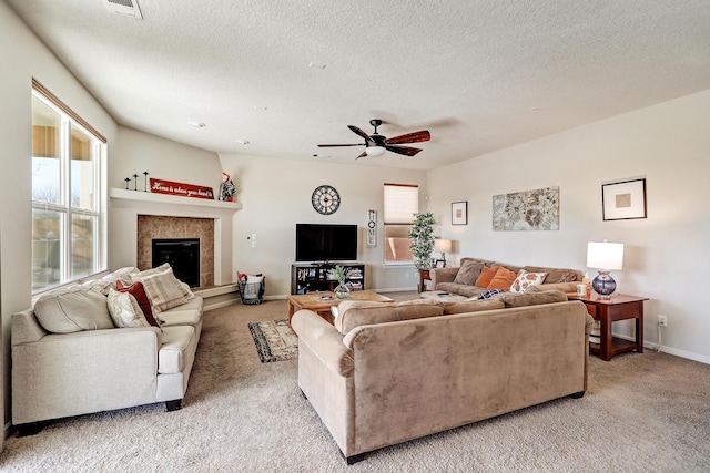15 Los Miradores Dr NE, Rio Rancho, NM 87124 - living room with plenty of natural light, light carpet, ceiling fan, and a textured ceiling