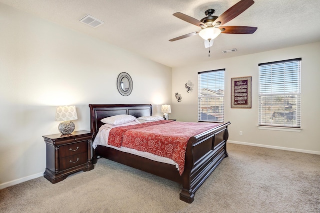15 Los Miradores Dr NE, Rio Rancho, NM 87124 - bedroom featuring light colored carpet, baseboards, and a ceiling fan