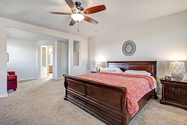 15 Los Miradores Dr NE, Rio Rancho, NM 87124 - bedroom featuring light carpet, baseboards, and a ceiling fan