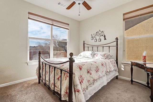 15 Los Miradores Dr NE, Rio Rancho, NM 87124 - carpeted bedroom with baseboards and ceiling fan